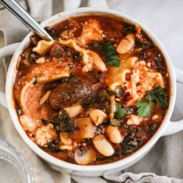 Vegan lasagna soup with white beans and mushrooms.