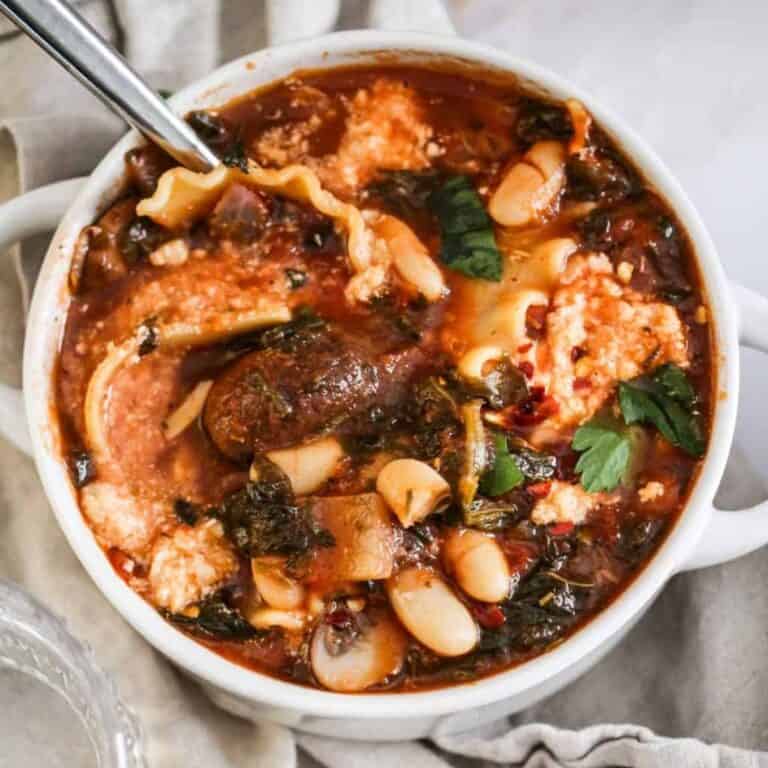 Vegan lasagna soup with white beans and mushrooms.