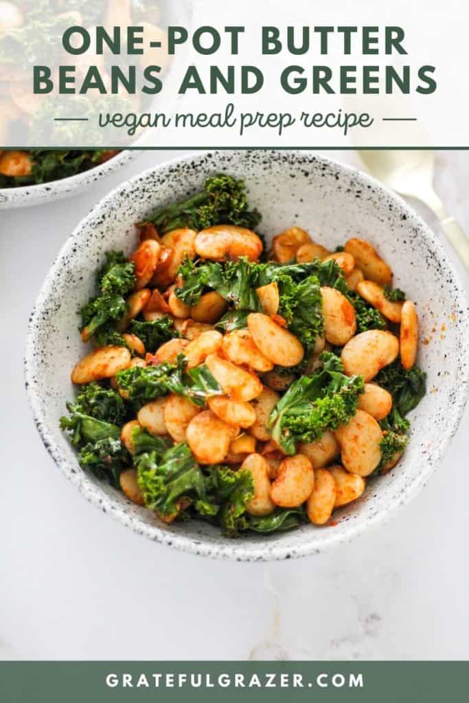 Butter beans and kale in a speckled white bowl with text reading, "One-Pot Butter Beans and Greens: Vegan Meal Prep Recipe; GratefulGrazer.com."