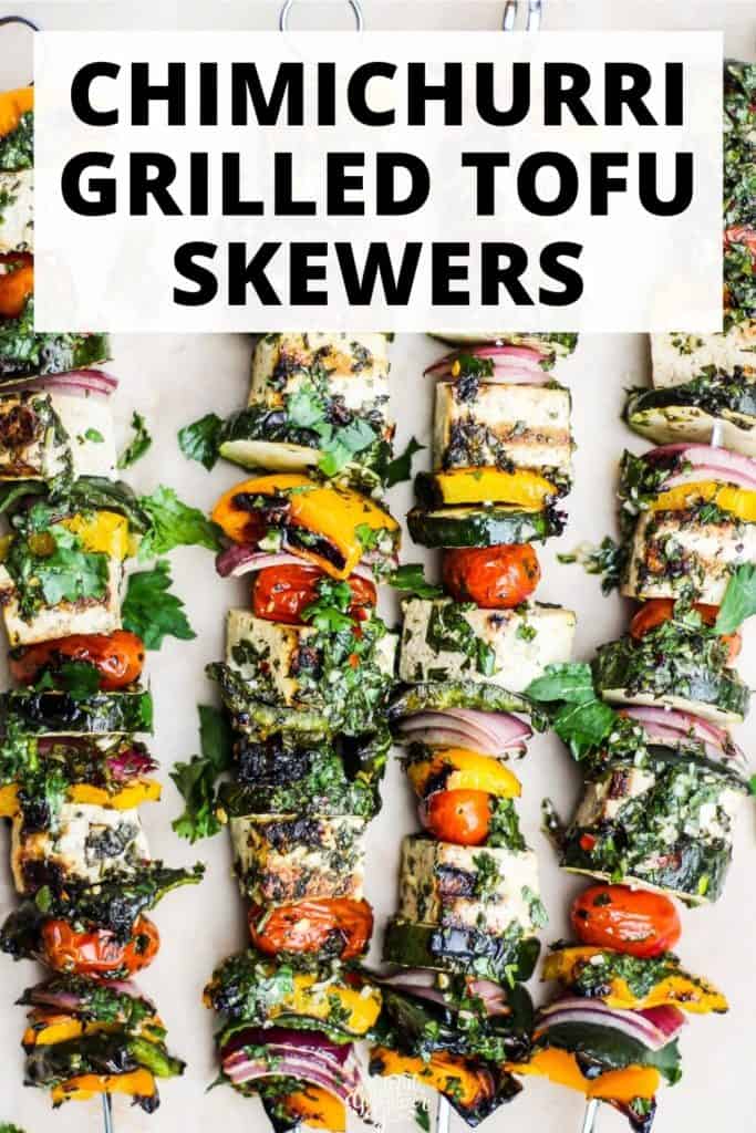 Tofu and vegetable skewers with green sauce and text reading, "Chimichurri Grilled Tofu Skewers."