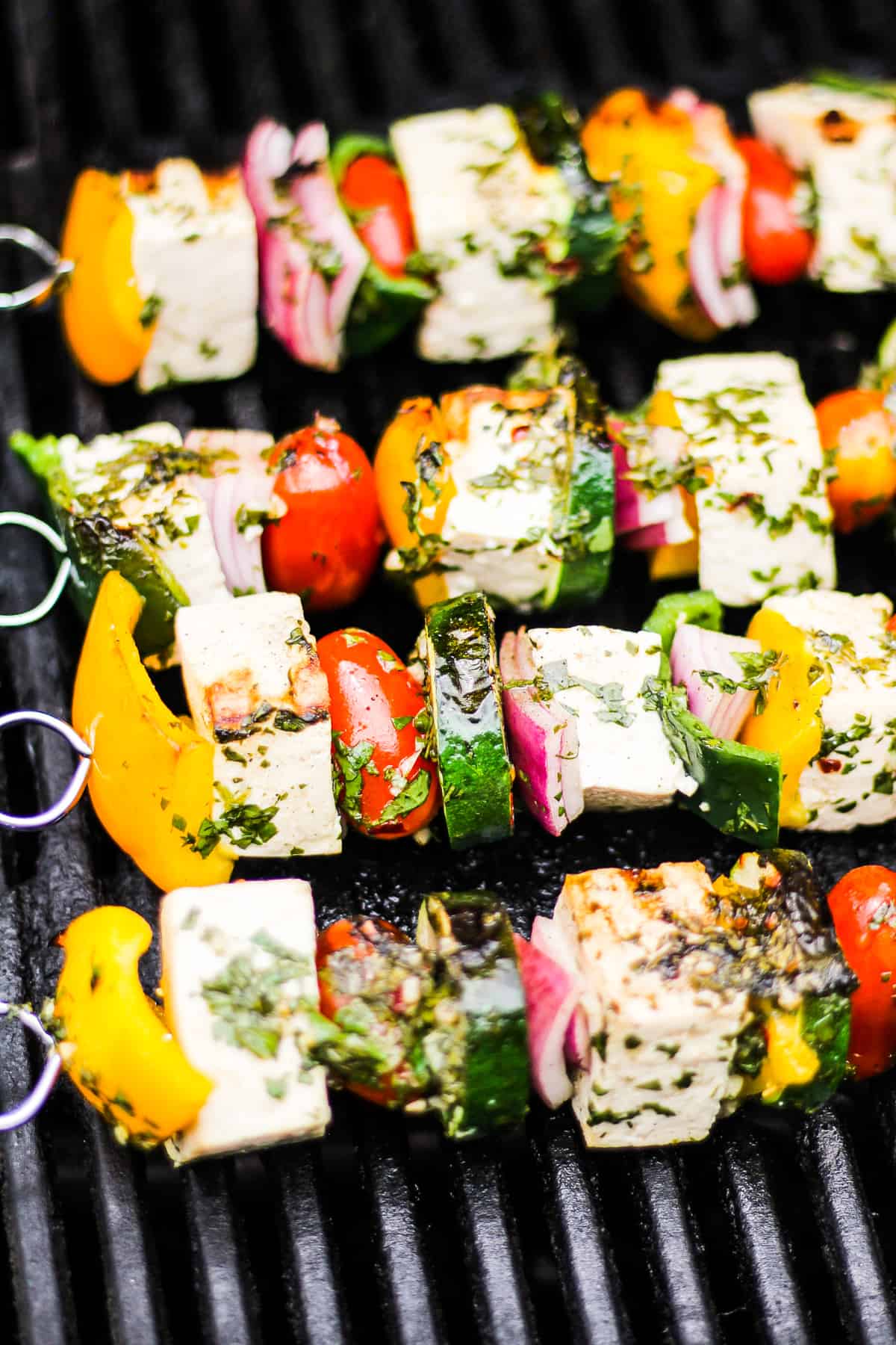 Veggie tofu skewers on the grill.