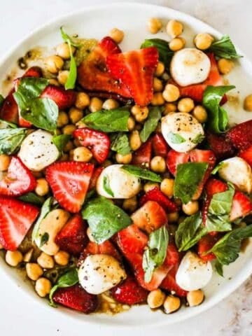 Strawberry chickpea salad with mozzarella and fresh basil for summer.