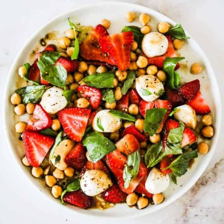 Strawberry chickpea salad with mozzarella and fresh basil for summer.
