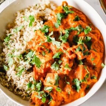 Vegan Tikka Masala with tofu and cauliflower served with basmati rice.