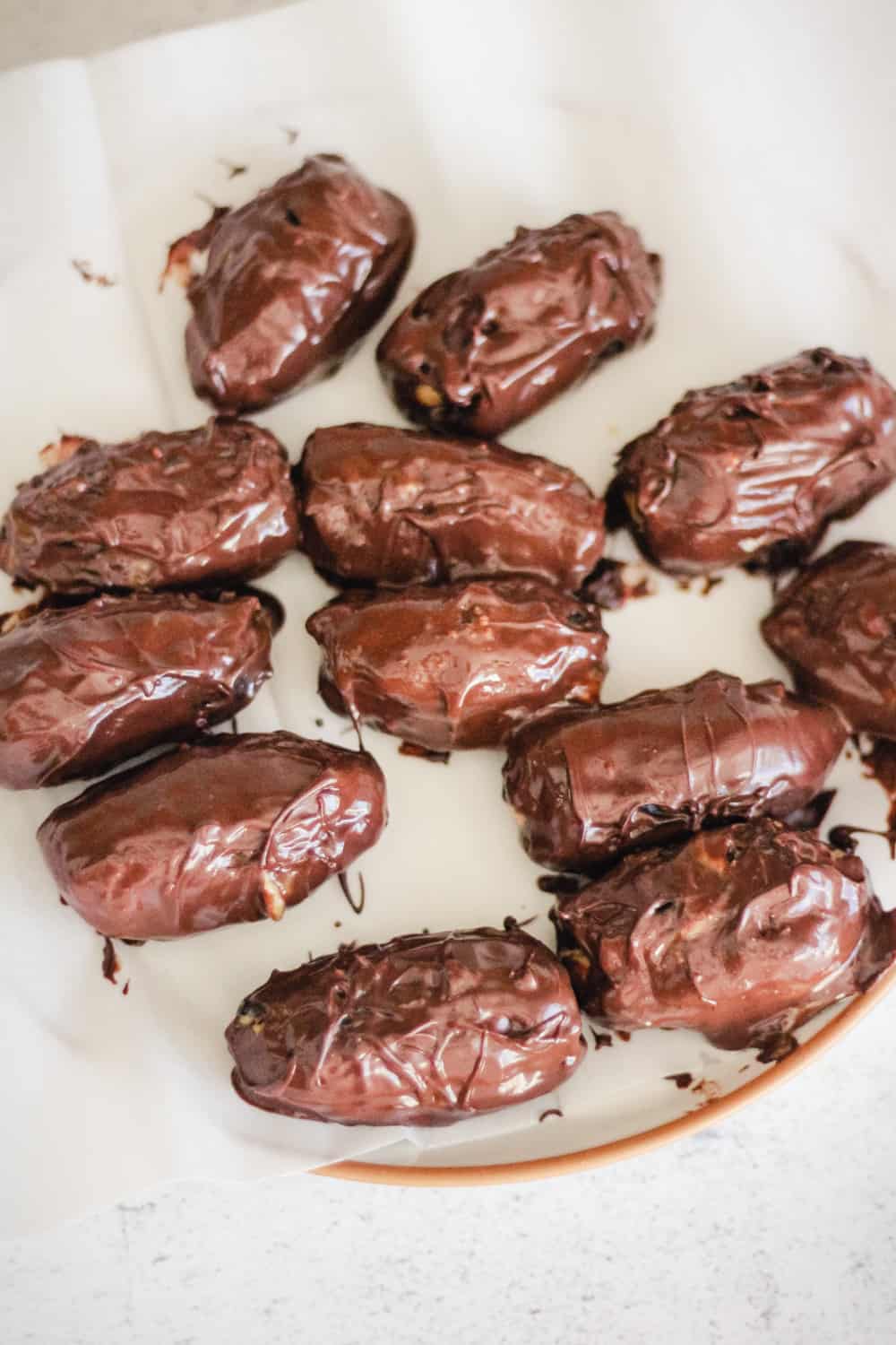 Dates covered in melted chocolate.
