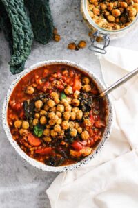 Tomato soup topped with roasted chickpeas.