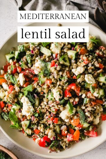 Lentil salad on a plate with text overlay that reads, "Mediterranean Lentil Salad."