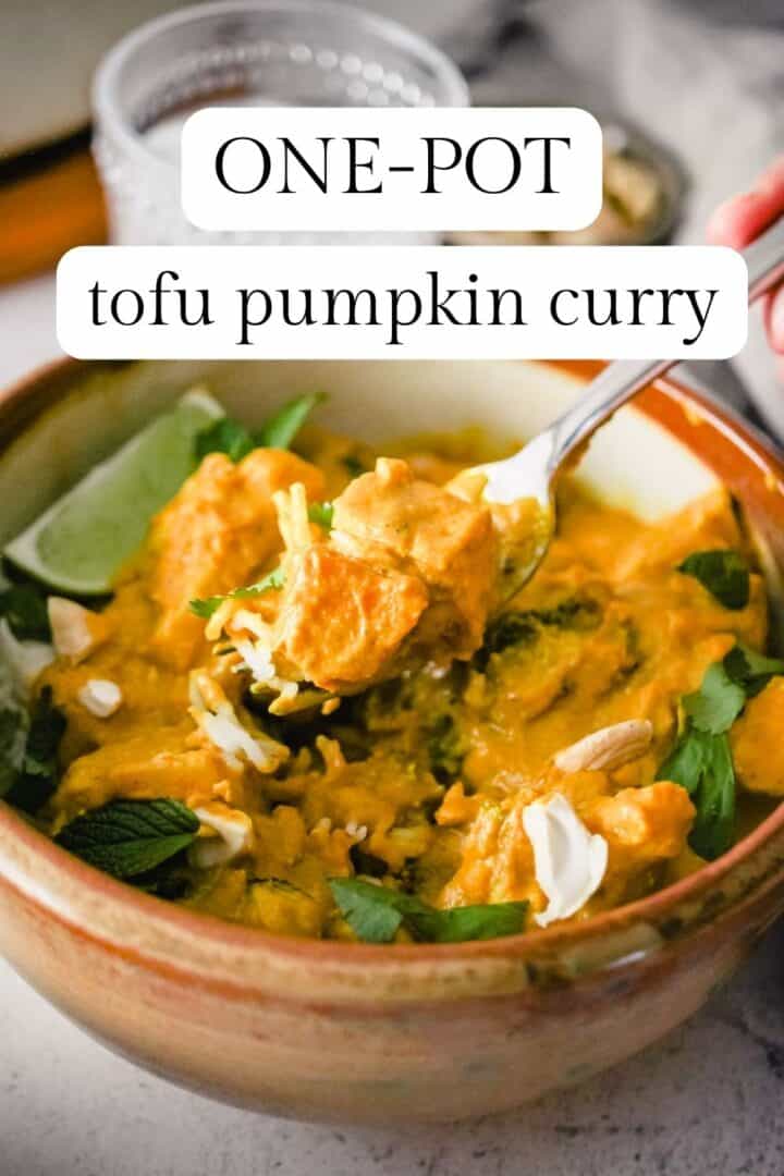 Yellow curry in a bowl with a text overlay that reads 