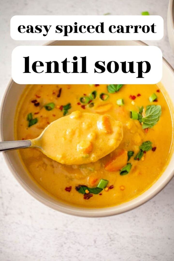 Bowl of creamy yellow soup with text overlay that reads, "easy spiced carrot and lentil soup."