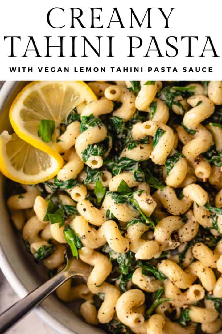 Closeup of tahini pasta with greens. The photo is labeled with the title, "Creamy Tahini Pasta with Vegan Lemon Tahini Pasta Sauce" at the top.