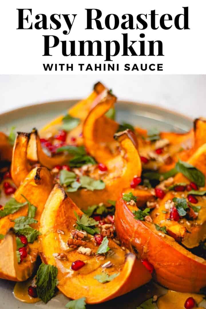 Roasted pumpkin wedges with toppings and title text that reads, "Easy Roasted Pumpkin with Tahini Sauce."