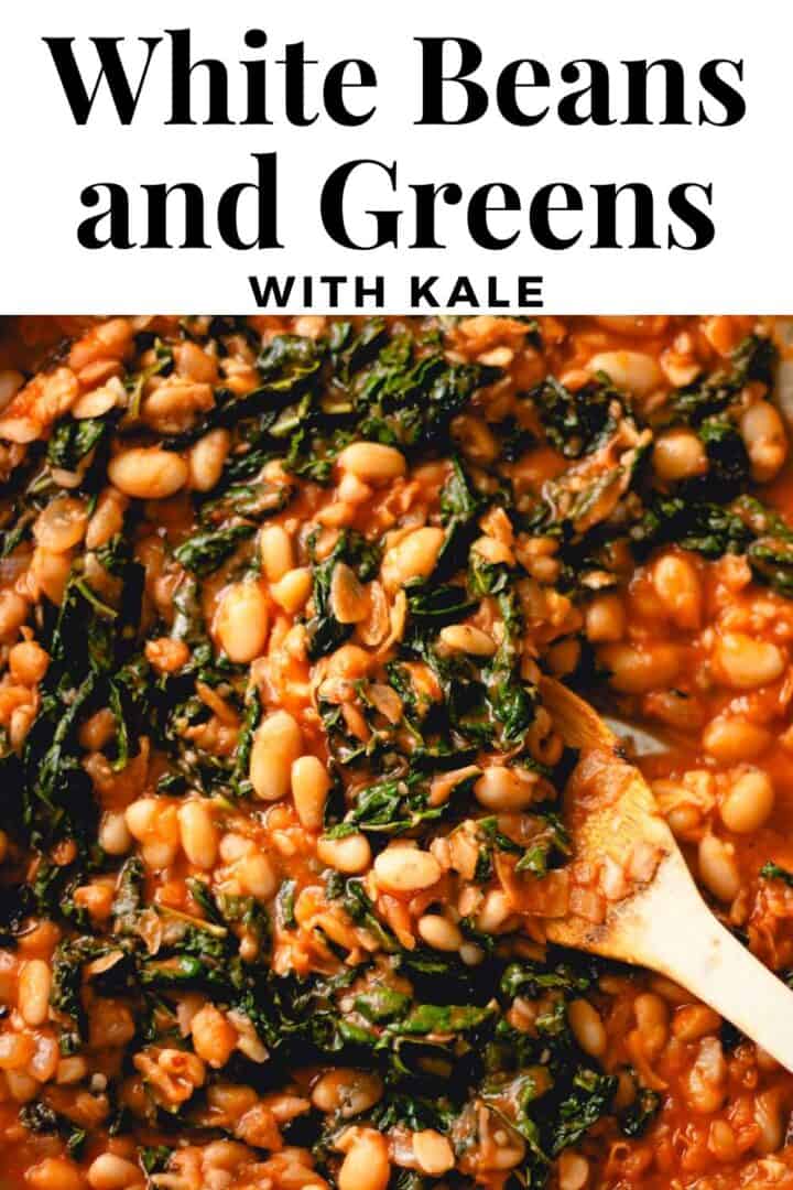 Closeup of beans and greens in a skillet with a wooden spoon. Title text reads, "White Beans and Greens with Kale."