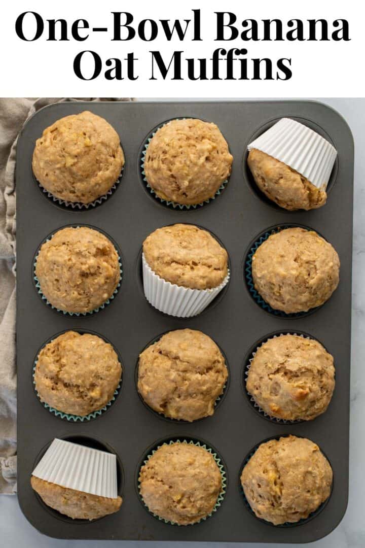 Banana muffins in a muffin pan with text that reads, "One-Bowl Banana Oat Muffins."