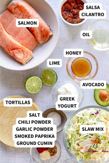 Ingredients to make salmon tacos with labels.