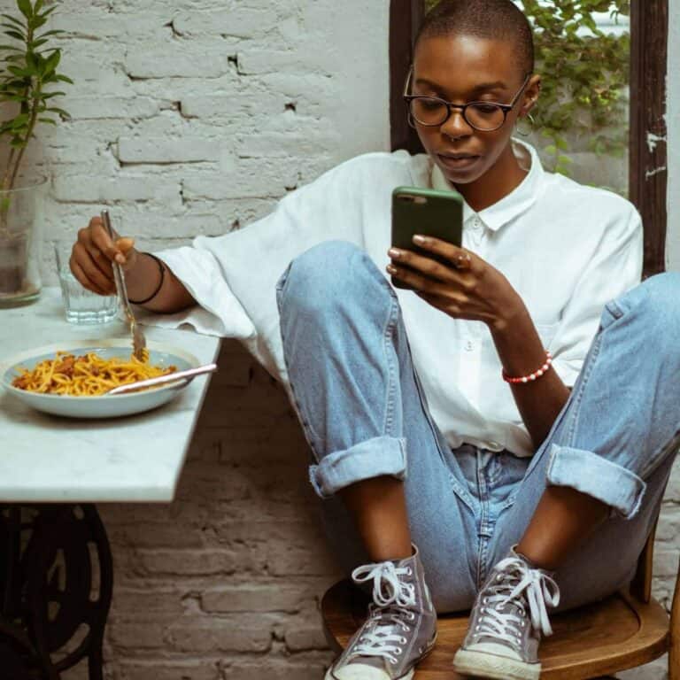 Woman tracking her food using an app.