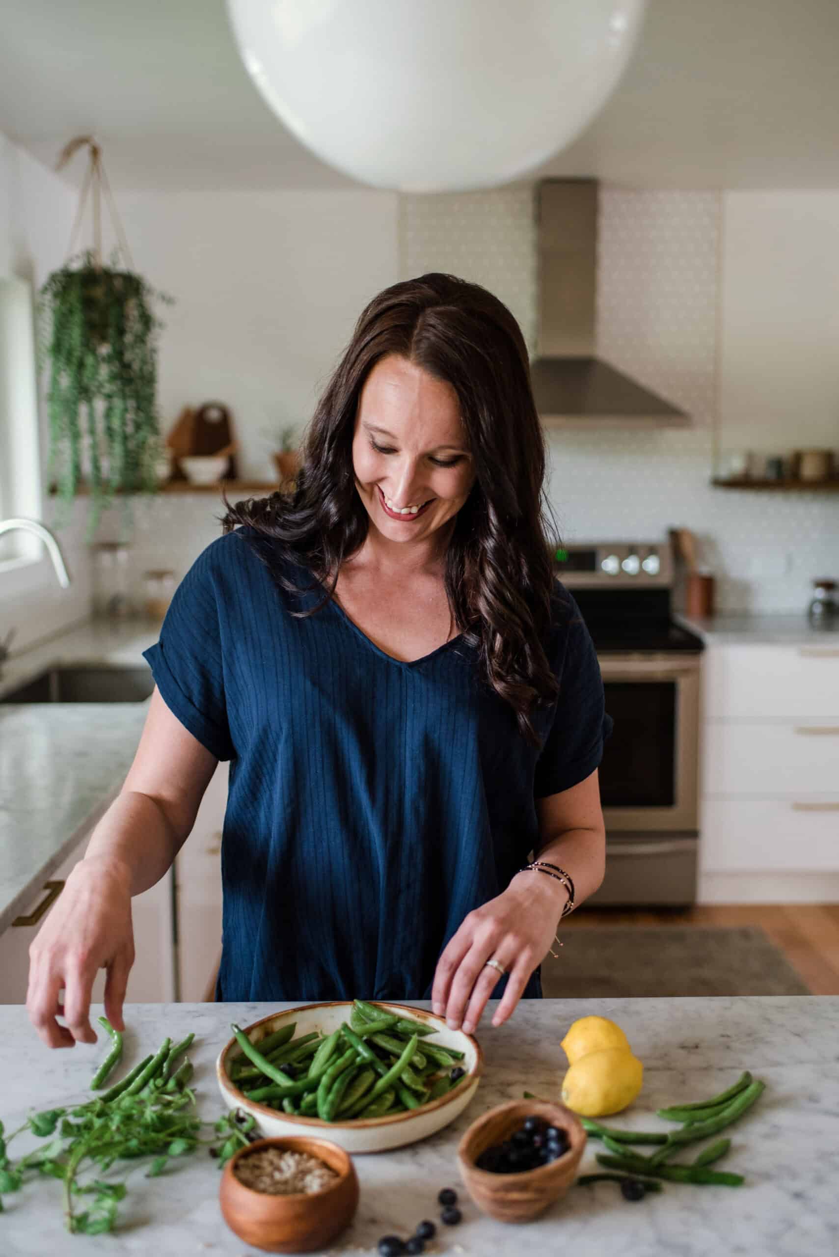 Stephanie McKercher preparing a vegetable dish.