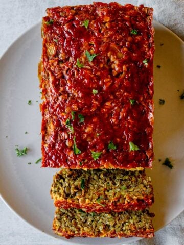 Serving a vegetarian lentil loaf.