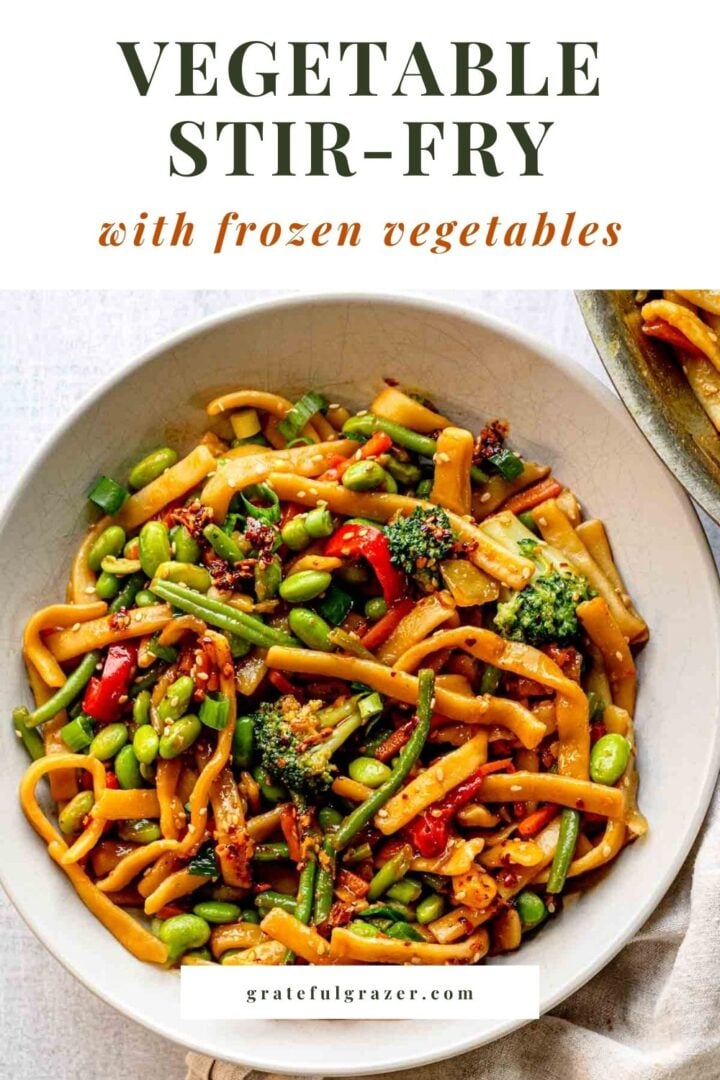 Noodle and vegetable stir-fry with edamame; text overlay reads: "Vegetable Stir-Fry with Frozen Vegetables"