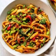Vegetable stir-fry with edamame and noodles.