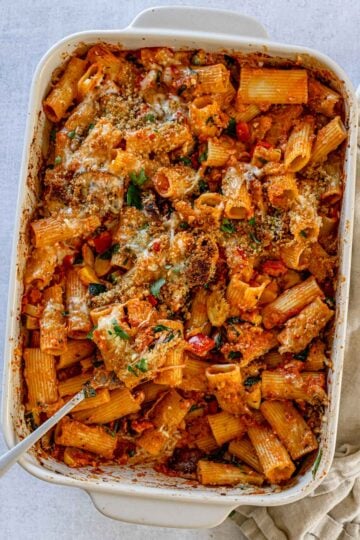 Vegetable baked pasta with rigatoni in a casserole dish.
