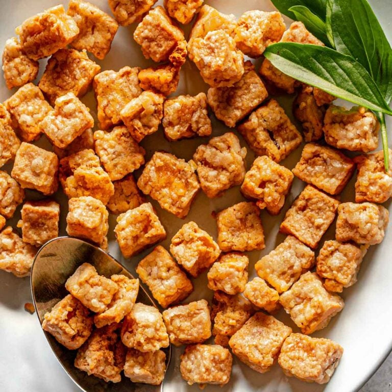 Closeup of crispy air fryer tofu with cornstarch.