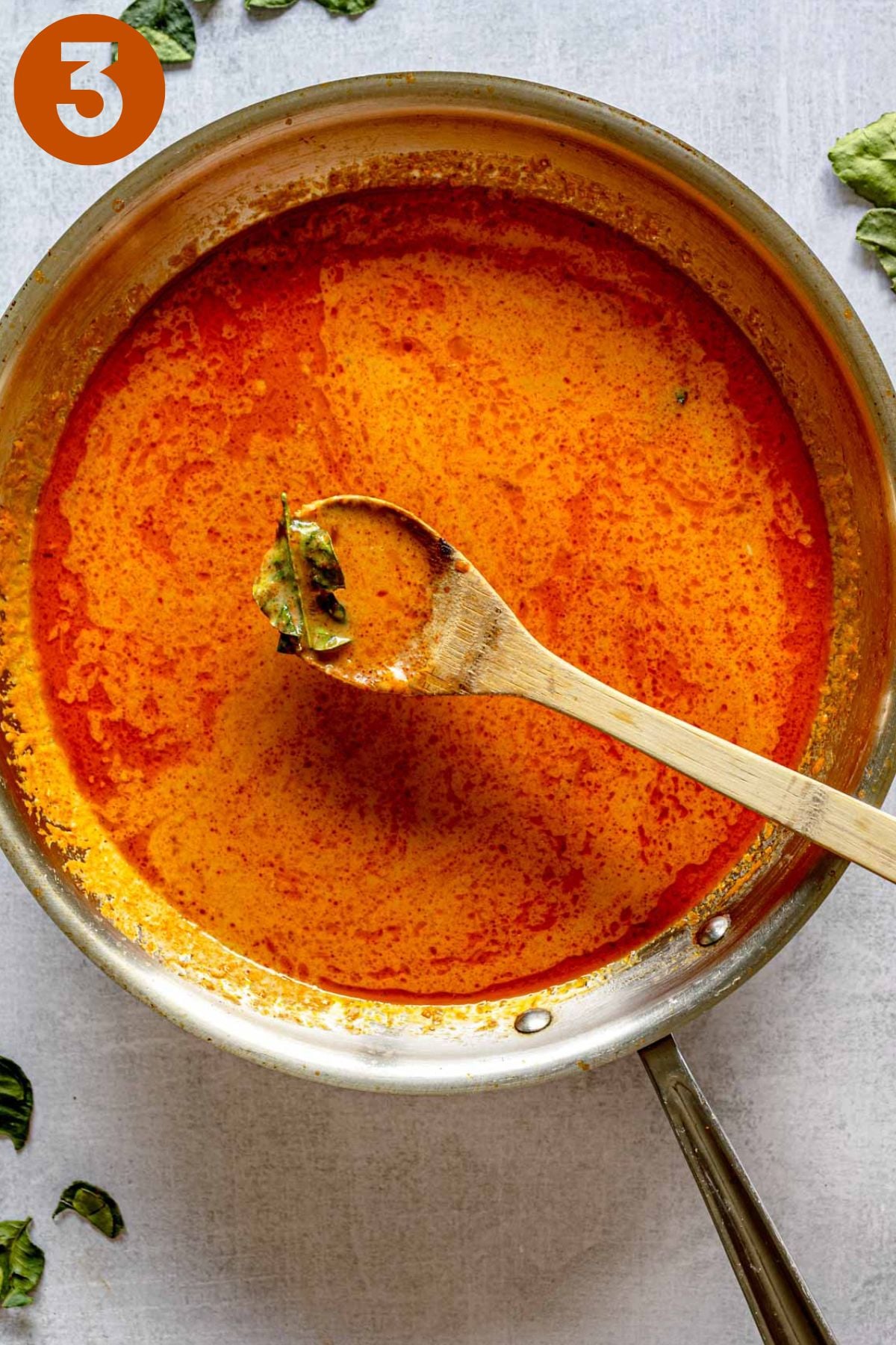 Thai red curry sauce in a skillet; labeled 3.